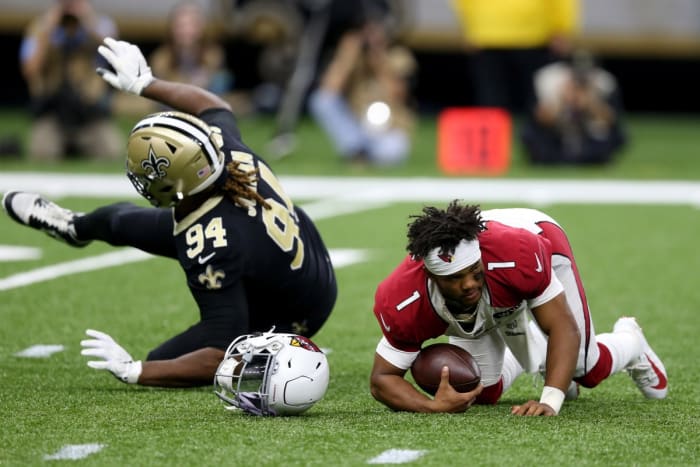 Oct 27, 2019; Arizona Cardinals quarterback Kyler Murray (1) loses his helmet after a sack by New Orleans Saints defensive end Cameron Jordan (94). Mandatory Credit: Chuck Cook-USA TODAY Sports
